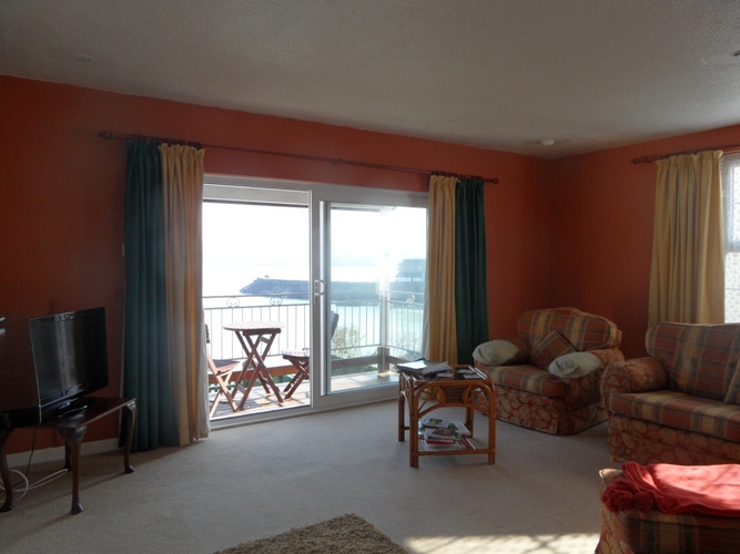 lounge at 30 Rock Street, New Quay, a holiday home to let with Harbour Homes